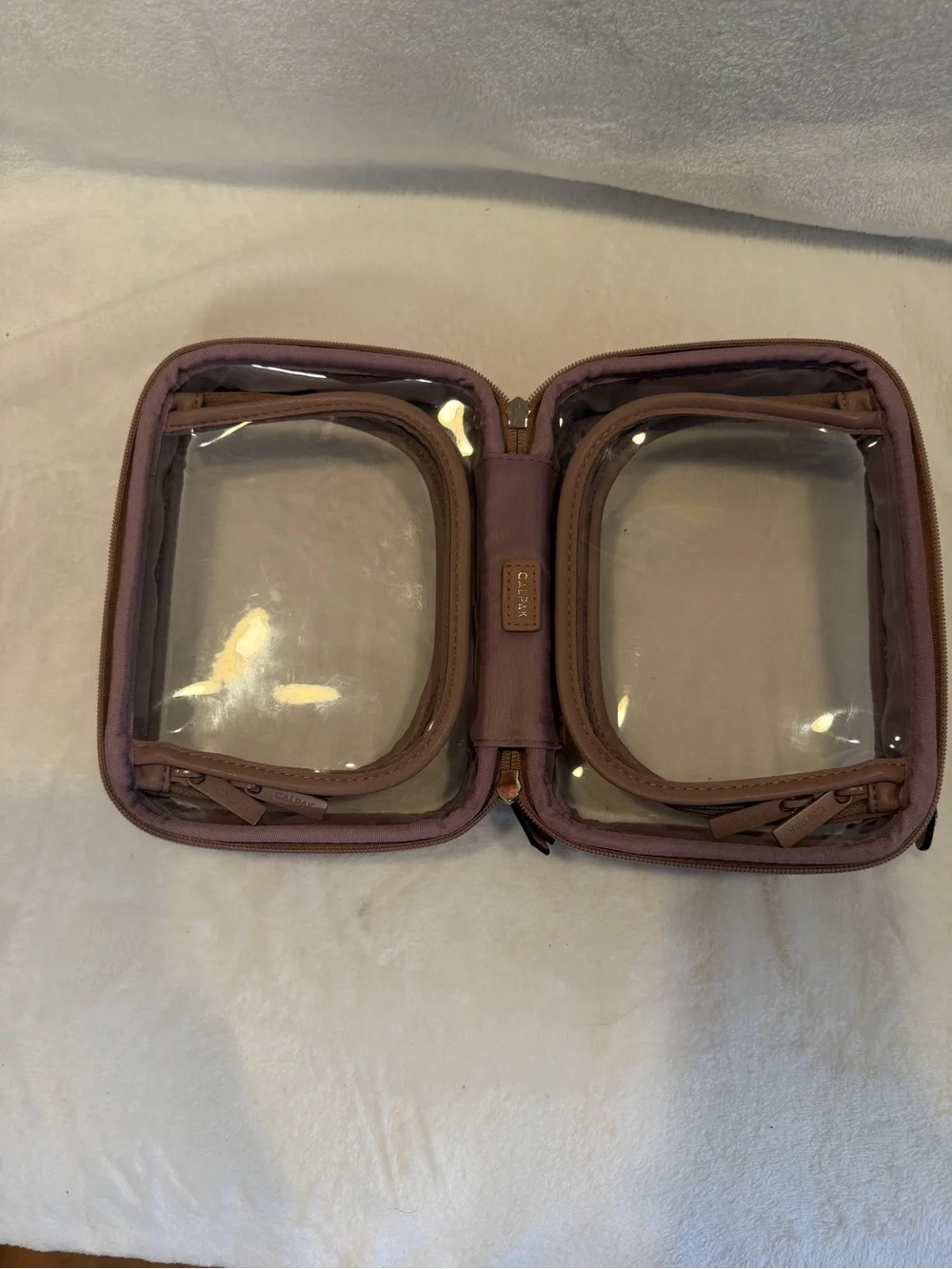 Calpak Small Clear Pink Travel Cosmetic Case in Mauve